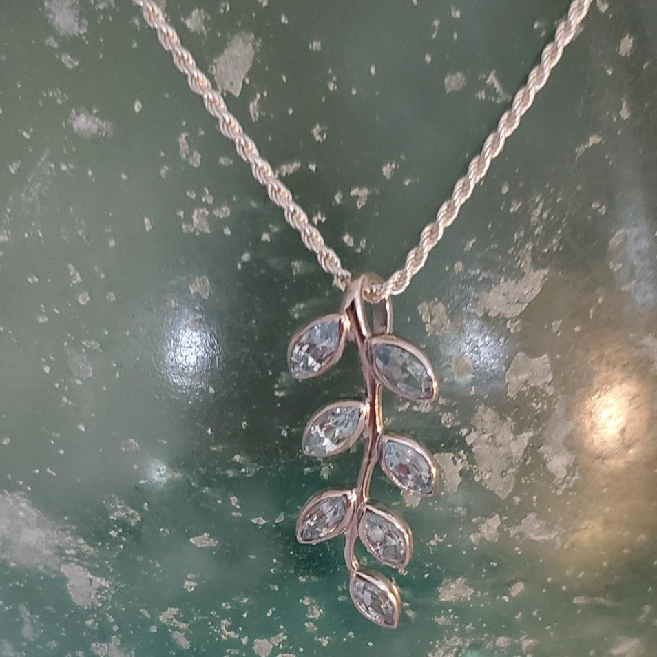 Sterling Silver Branch Necklace with Blue Topaz Leaves