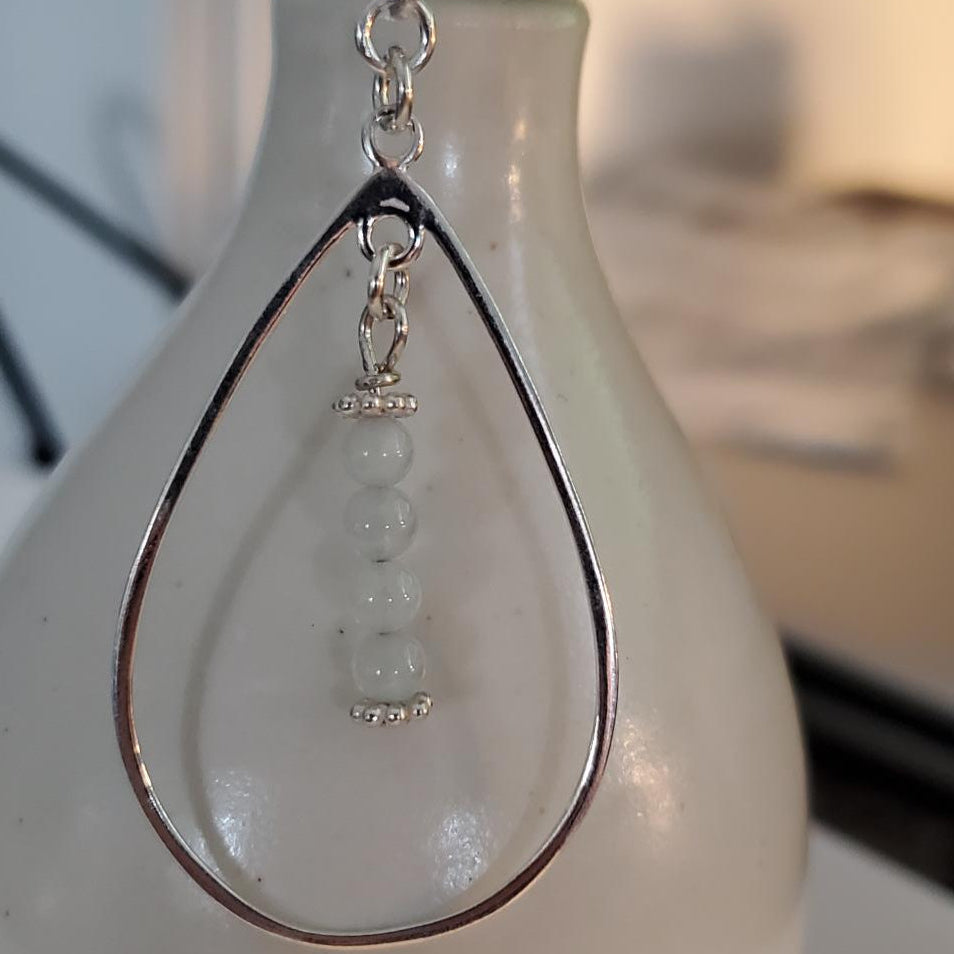 Sterling Silver Fleur-de-Lis and Aquamarine Teardrop Earrings Plein De Vie Jewelry