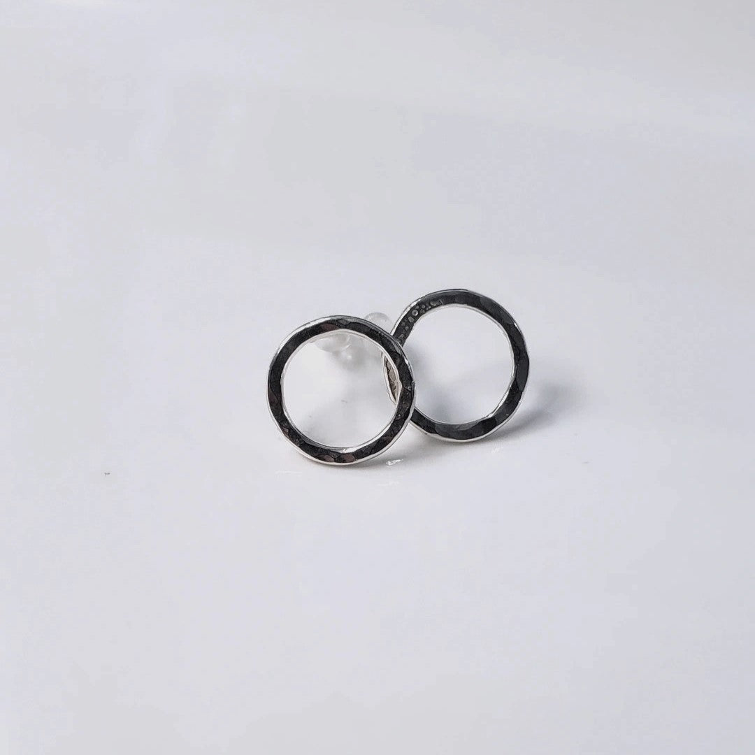 Handmade Circle of Life Post Earrings: Exquisite 16-gauge sterling silver circles, 1/2" in diameter, symbolizing simplicity with profound depth. Perfect for elegance in simplicity, personal interpretation, discerning individuals, and timeless sophistication.