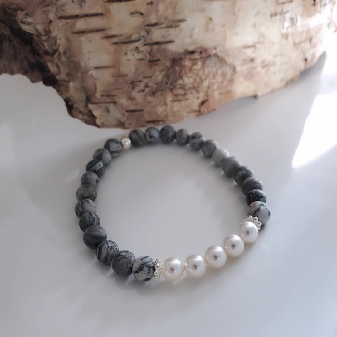 Introducing my 6mm Picture Jasper Gemstone and Swarovski Pearl Bracelet – crafted for elegance and tranquility. Picture Jasper soothes the soul, paired with Sterling Silver daisy spacers and Swarovski Pearls for timeless grace. Wear it solo or stacked for versatile elegance.