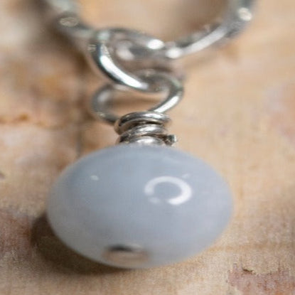 Introducing my Sterling Silver Aquamarine Oval Link Leverback Earrings: a blend of aquamarine's softness with textured silver links. Versatile for any occasion, they add elegance to everyday wear and charm to formal attire. Ideal as a thoughtful gift or a serene addition to your jewelry collection, they embody peace and tranquility with every wear.