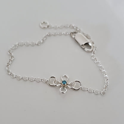 Handmade floral sterling silver bracelet with a daisy flower charm