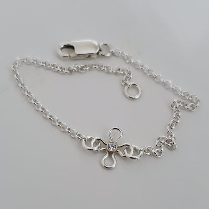 Sterling silver flower charm bracelet, refined everyday handmade design