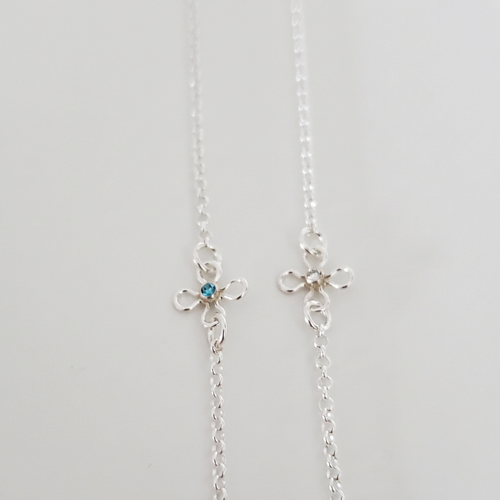 Brightened blue and clear bracelet comparison