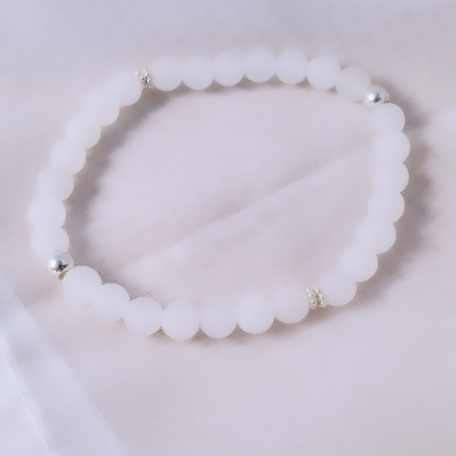 Icy Whispers: Sterling Silver Snowflake & White Jade Bracelet - Plein De Vie Jewelry
