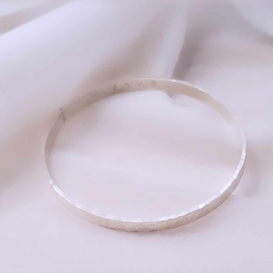 Minimalist Marvel: Sterling Silver Dimple Bangle Bracelet