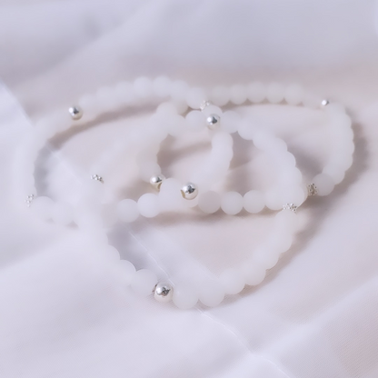 Icy Whispers: Sterling Silver Snowflake & White Jade Bracelet - Plein De Vie Jewelry