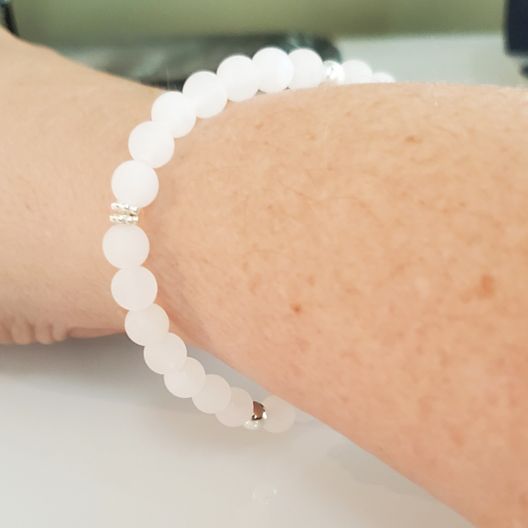 Icy Whispers: Sterling Silver Snowflake & White Jade Bracelet - Plein De Vie Jewelry